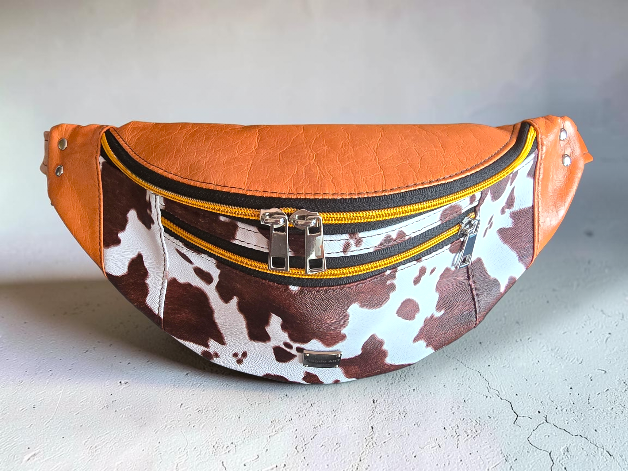 COW & ORANGE – nerka w krowie łaty - obrazek 3
